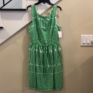 Trina Turk green tea dress with pink belt